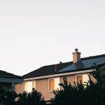 Solar panels on a rooftop of a Canadian home, highlighting their role in reducing average energy consumption and providing financial and environmental benefits.